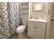 Clean bathroom with toilet, sink, and shower at 12663 Eddington Rd, Spring Hill, FL 34609