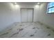 Spacious bedroom with tile floors and double door closet at 12663 Eddington Rd, Spring Hill, FL 34609