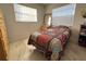 Small bedroom with twin-sized bed and dresser at 12663 Eddington Rd, Spring Hill, FL 34609