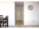 Clean hallway with tiled flooring and a door to another room at 12663 Eddington Rd, Spring Hill, FL 34609