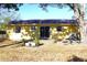 Back of the house showcasing a sliding glass door and AC unit at 12663 Eddington Rd, Spring Hill, FL 34609