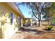 Side view of house showing exterior and part of backyard at 12663 Eddington Rd, Spring Hill, FL 34609