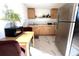 Cozy kitchen with light wood cabinets and modern appliances at 12663 Eddington Rd, Spring Hill, FL 34609