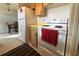 Kitchen with white appliances and wood cabinets at 12663 Eddington Rd, Spring Hill, FL 34609