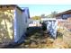 Side yard with a partial view of the neighboring house at 12663 Eddington Rd, Spring Hill, FL 34609