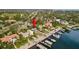 Waterfront home nestled amongst other luxury homes at 140 Brightwaters Ne Blvd, St Petersburg, FL 33704