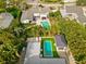 Aerial view showcasing a home with two pools and a large backyard at 140 Brightwaters Ne Blvd, St Petersburg, FL 33704