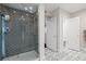 Modern bathroom with gray quatrefoil tile shower at 140 Brightwaters Ne Blvd, St Petersburg, FL 33704