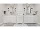 Bathroom with double vanity and marble countertops at 140 Brightwaters Ne Blvd, St Petersburg, FL 33704