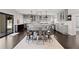 Bright kitchen with gray cabinets and a breakfast bar at 140 Brightwaters Ne Blvd, St Petersburg, FL 33704