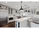 Spacious kitchen with an eat-in island and stainless steel appliances at 140 Brightwaters Ne Blvd, St Petersburg, FL 33704