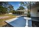 Expansive backyard with a carport and deck provide plenty of outdoor space at 215 35Th Ne Ave, St Petersburg, FL 33704