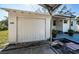 Attached garage with convenient entry, providing secure parking and storage next to the house at 215 35Th Ne Ave, St Petersburg, FL 33704