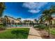 Complex exterior showing walkway to the pool at 2209 Belleair Rd # C15, Clearwater, FL 33764