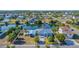 Aerial view of waterfront home with large lot and detached garage at 3295 Hibiscus Dr, Hernando Beach, FL 34607