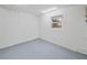 Unfinished basement with a solitary window, offering a blank canvas for customized design at 3295 Hibiscus Dr, Hernando Beach, FL 34607
