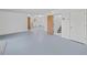 Spacious basement with painted floor, access to stairs, and plenty of potential for customization at 3295 Hibiscus Dr, Hernando Beach, FL 34607