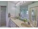 Bright bathroom with a double sink vanity, large mirror, and walk-in shower offers great space at 3295 Hibiscus Dr, Hernando Beach, FL 34607