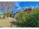 Lovely outdoor space with multi-level decks, flowering bushes and providing ample space for entertaining or relaxing at 3295 Hibiscus Dr, Hernando Beach, FL 34607