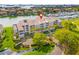 Aerial view of condo building near water at 6260 Kipps Colony Ct # 204, Gulfport, FL 33707