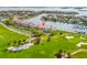 Condo building with water and golf views at 6260 Kipps Colony Ct # 204, Gulfport, FL 33707