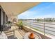 Balcony boasts a waterfront view and comfortable seating at 6260 Kipps Colony Ct # 204, Gulfport, FL 33707