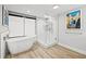 Modern bathroom with soaking tub and glass shower at 6260 Kipps Colony Ct # 204, Gulfport, FL 33707