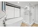 Modern bathroom with soaking tub and glass shower at 6260 Kipps Colony Ct # 204, Gulfport, FL 33707