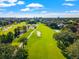 Lush green golf course with tree-lined fairways at 6260 Kipps Colony Ct # 204, Gulfport, FL 33707