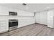 Modern kitchen with white cabinets, quartz countertops and stainless steel appliances at 6260 Kipps Colony Ct # 204, Gulfport, FL 33707