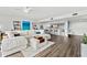 Open living room with kitchen and dining area visible at 6260 Kipps Colony Ct # 204, Gulfport, FL 33707