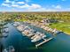 Drone shot of a full-service marina with many boats and a clubhouse at 6260 Kipps Colony Ct # 204, Gulfport, FL 33707