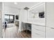 Bright vanity area with built-in drawers and large mirror at 6260 Kipps Colony Ct # 204, Gulfport, FL 33707