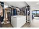 Spacious walk-in closet with ample shelving and hanging space at 6260 Kipps Colony Ct # 204, Gulfport, FL 33707