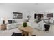 Open-concept living room with designer furniture and decor, perfect for relaxing and entertaining at 741 58Th Ne Ave, St Petersburg, FL 33703