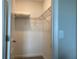 Small closet with wire shelving for storage at 10058 Corso Milano Dr, Tampa, FL 33625