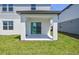 The covered patio with sliding glass door offers outdoor living space at 10533 Hidden Banks Gln, Parrish, FL 34219
