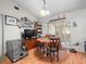 Dining area with table and chairs, adjacent to a sunroom at 10556 Blythville Rd, Spring Hill, FL 34608