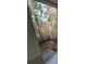 Small backyard with a wood fence and a tree at 1182 Norwood Ave, Clearwater, FL 33756