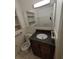 Bathroom with granite vanity and updated fixtures at 1182 Norwood Ave, Clearwater, FL 33756