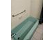 Bathroom featuring a clean bathtub and tiled walls, perfect for a relaxing bath at 1182 Norwood Ave, Clearwater, FL 33756