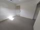 Bright bedroom with carpet flooring and ample closet space at 1182 Norwood Ave, Clearwater, FL 33756