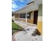 Charming front porch with white railing, steps and appealing curb appeal at 1182 Norwood Ave, Clearwater, FL 33756