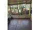 This screened-in patio offers a relaxing space at 1182 Norwood Ave, Clearwater, FL 33756
