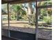 This screened-in patio offers a relaxing space to enjoy the outdoors at 1182 Norwood Ave, Clearwater, FL 33756