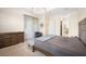 Main bedroom with sitting area and ensuite bathroom access at 12241 Perennial Pl, Bradenton, FL 34211