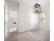 Bright dining room with carpeting and a chandelier at 12241 Perennial Pl, Bradenton, FL 34211
