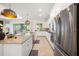 Modern kitchen with stainless steel appliances and granite countertops at 12241 Perennial Pl, Bradenton, FL 34211