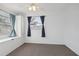 Bedroom with built-in window seat and ceiling fan at 1593 76Th N Ave, St Petersburg, FL 33702