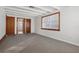 Bedroom with gray carpet and window with blinds at 1593 76Th N Ave, St Petersburg, FL 33702